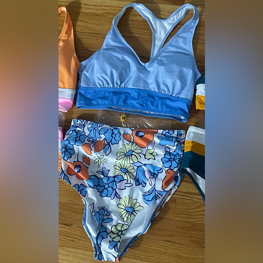 Brand new swimsuit. Never worn. Medium.